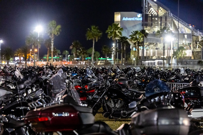 A view of the motorcycle parking area at the American Flat Track (AFT) Daytona Short Track I at Daytona International Speedway, 2023.